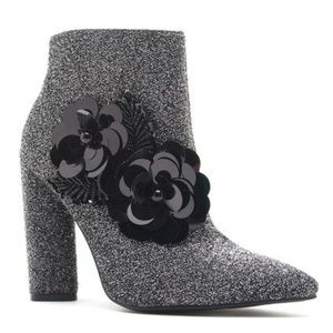 NIB Qupid Pewter High Heel Lurex Bootie with Black Floral Embellishment